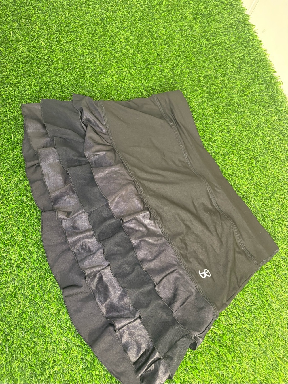 Black Ruffled Athletic Skort with Logo and under shorts